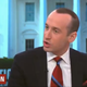 Illustration for article titled Stephen Miller Now Has Exactly One Thing In Common With Carlos Boozerem/em